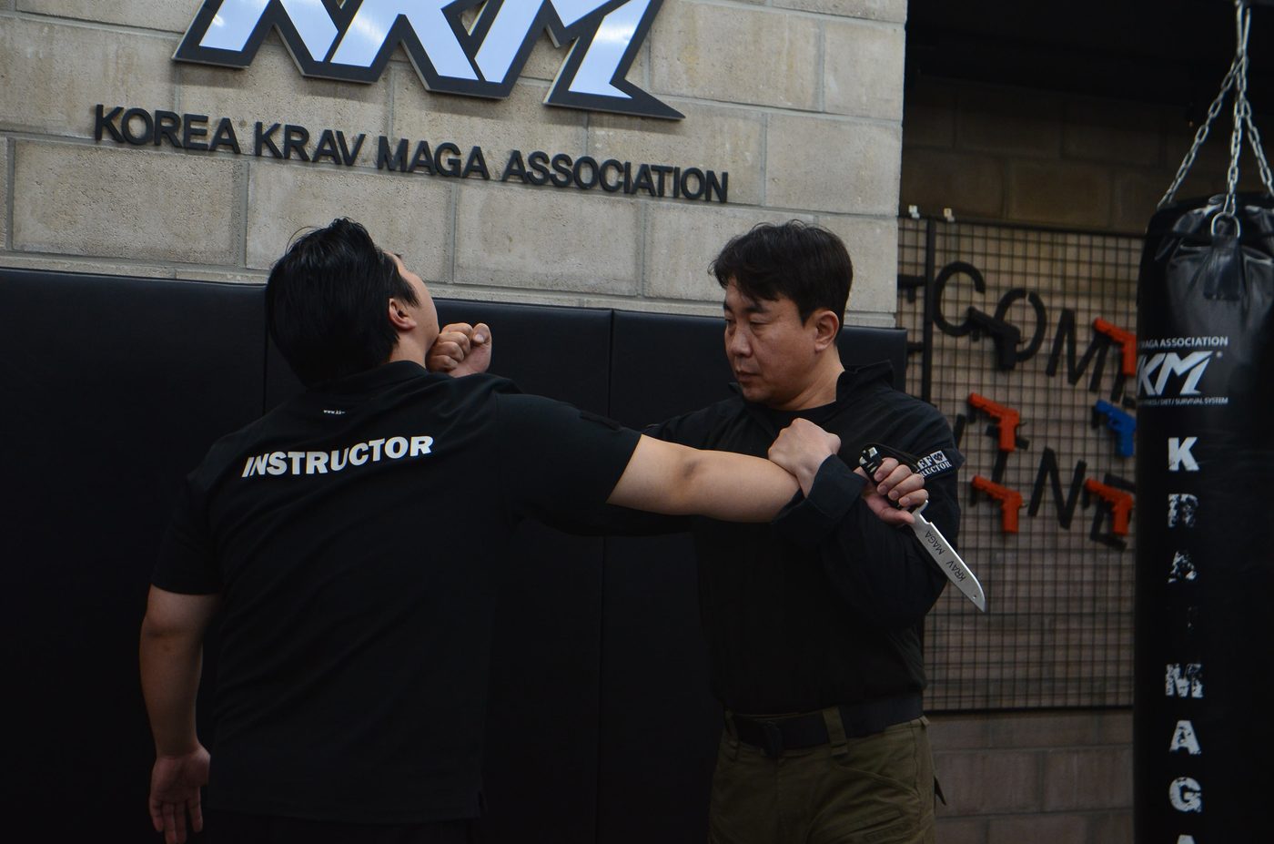 Chairman Koo Bon-geun demonstrating a KKM Ku System technique at Korea Krav Maga Association headquarters